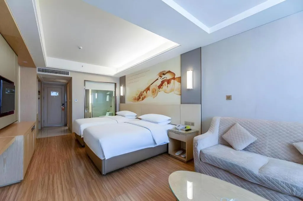 Bed in Vienna Hotel Hunan Huaihua Xupu Wanda Plaza
