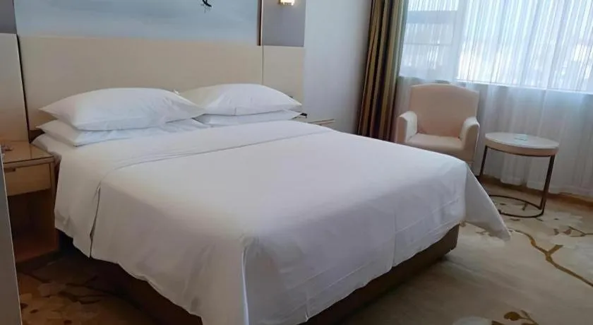 Bed in Vienna Hotel Hunan Huaihua Xupu Wanda Plaza