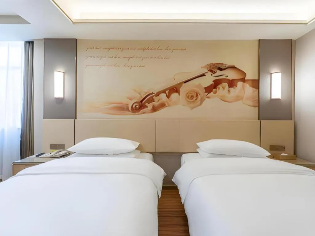 Bed in Vienna Hotel Hunan Huaihua Xupu Wanda Plaza