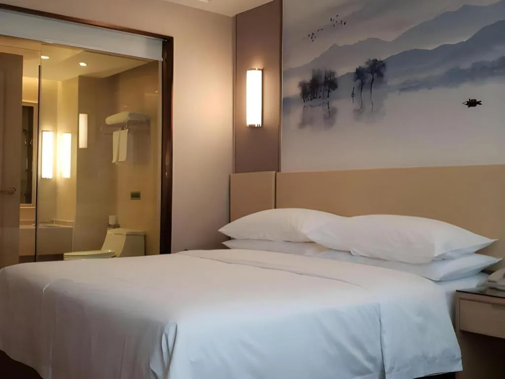 Bed in Vienna Hotel Hunan Huaihua Xupu Wanda Plaza