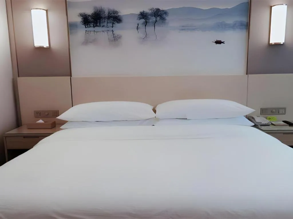 Bed in Vienna Hotel Hunan Huaihua Xupu Wanda Plaza