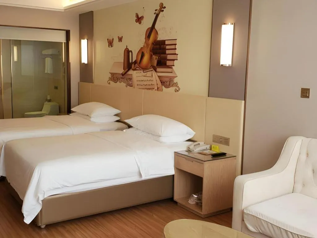 Bed in Vienna Hotel Hunan Huaihua Xupu Wanda Plaza