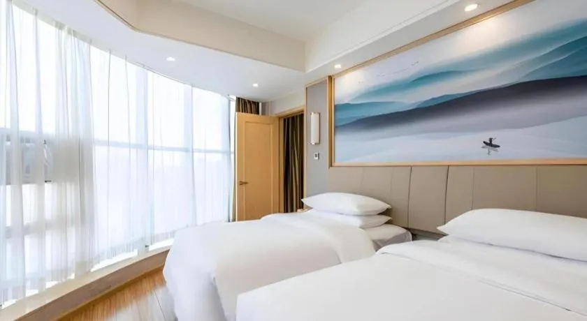 Bed in Vienna Hotel Hunan Huaihua Xupu Wanda Plaza