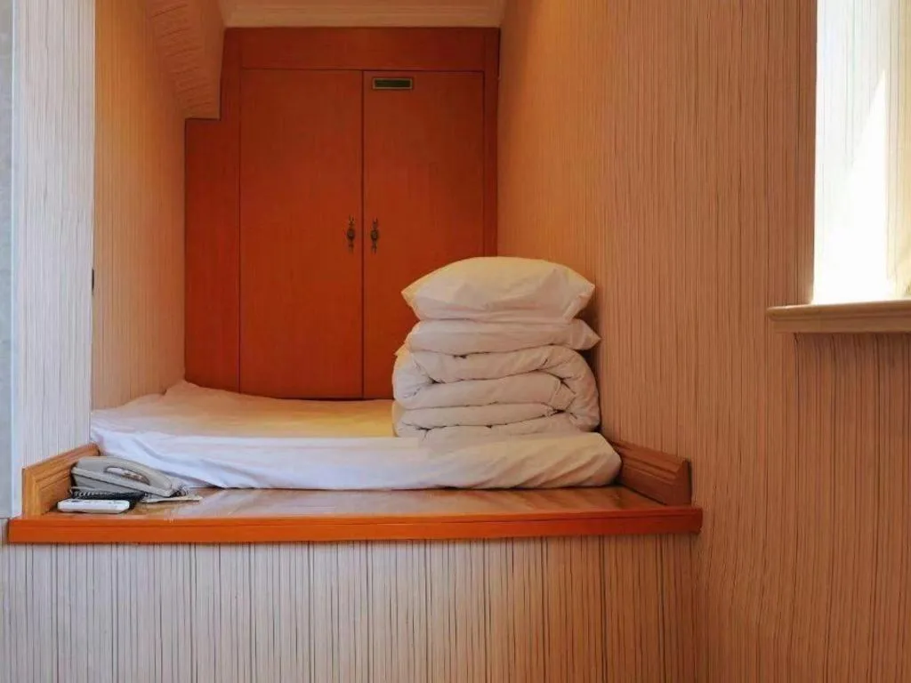 Bed in Vienna Hotel Inner Mongolia Tongliao Development Zone