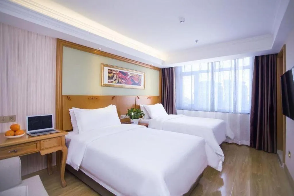 Bed in Vienna Hotel Inner Mongolia Tongliao Development Zone