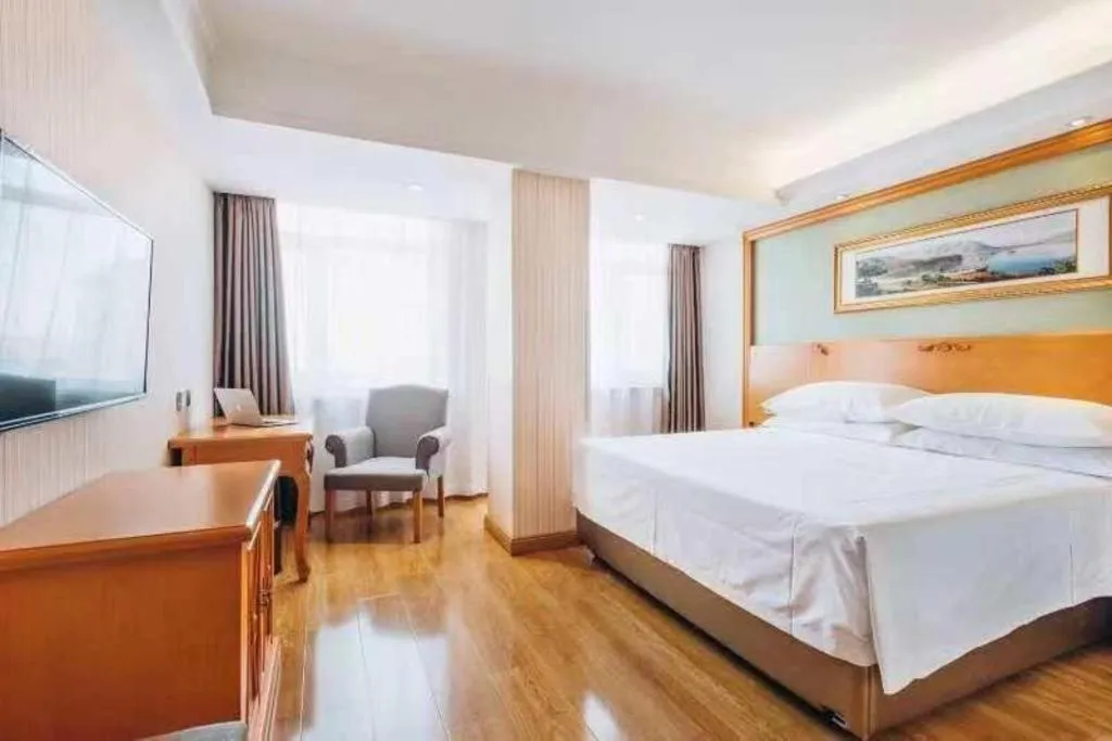 Bed in Vienna Hotel Inner Mongolia Tongliao Development Zone