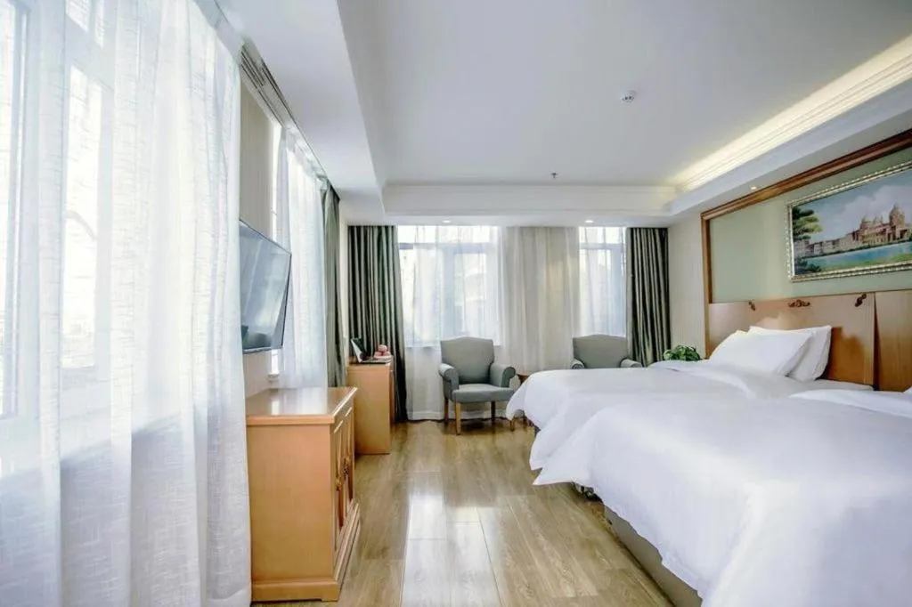 Bed in Vienna Hotel Inner Mongolia Tongliao Development Zone