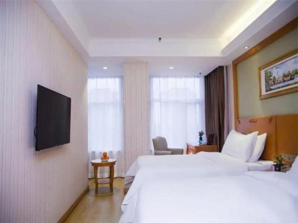 Bed in Vienna Hotel Inner Mongolia Tongliao Development Zone