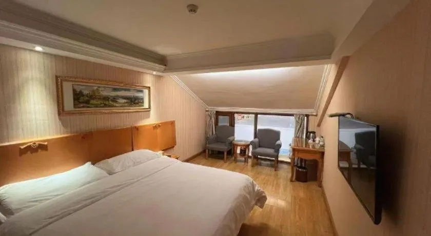 Bed in Vienna Hotel Inner Mongolia Tongliao Development Zone