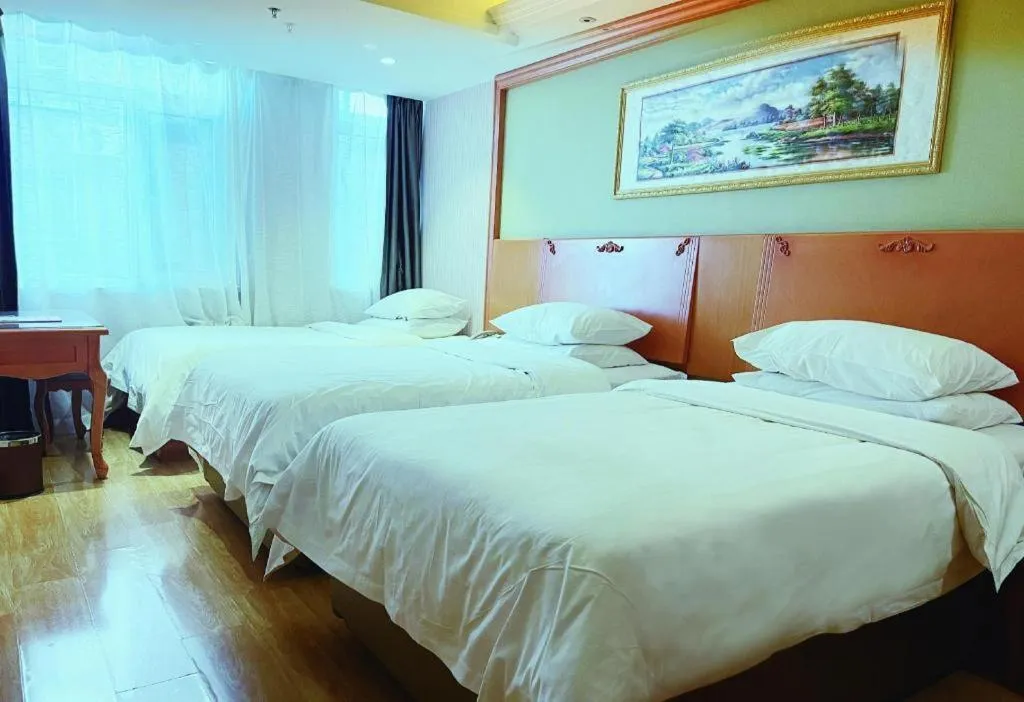 Bed in Vienna Hotel Inner Mongolia Tongliao Development Zone