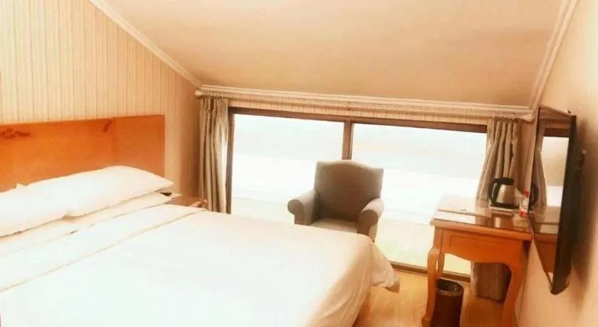 Bed in Vienna Hotel Inner Mongolia Tongliao Development Zone