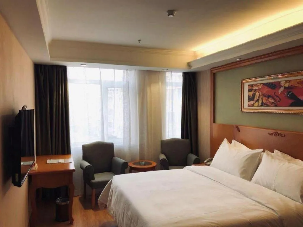 Bed in Vienna Hotel Inner Mongolia Tongliao Development Zone