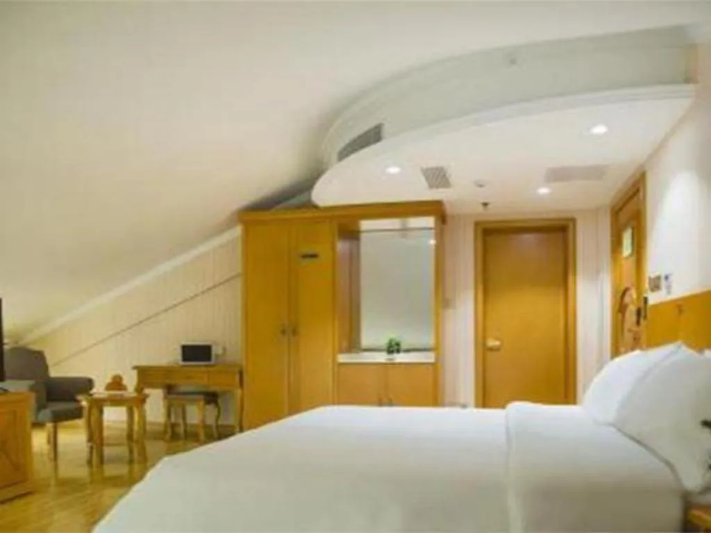 Bed in Vienna Hotel Inner Mongolia Tongliao Development Zone