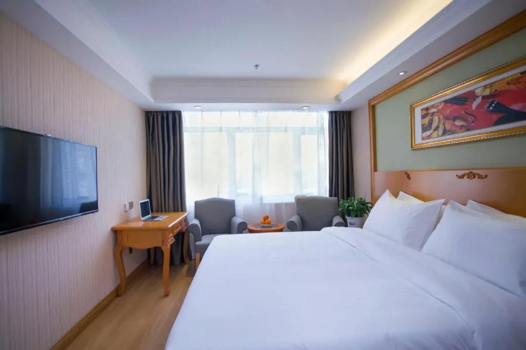 Bed in Vienna Hotel Inner Mongolia Tongliao Development Zone