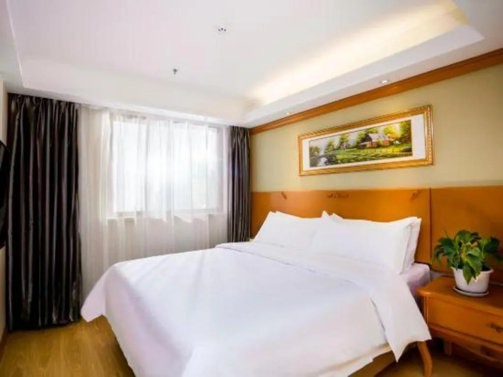 Bed in Vienna Hotel Inner Mongolia Tongliao Development Zone