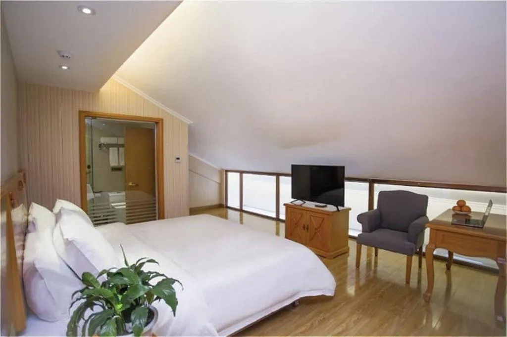 Bed in Vienna Hotel Inner Mongolia Tongliao Development Zone