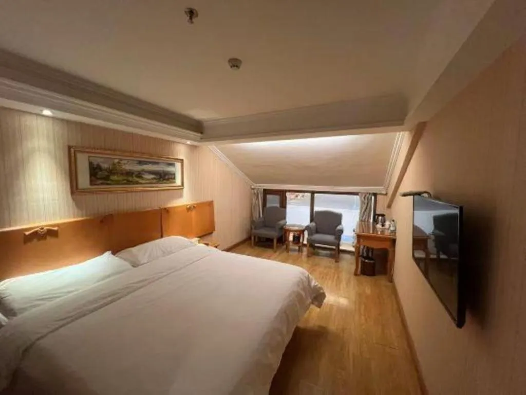 Bed in Vienna Hotel Inner Mongolia Tongliao Development Zone