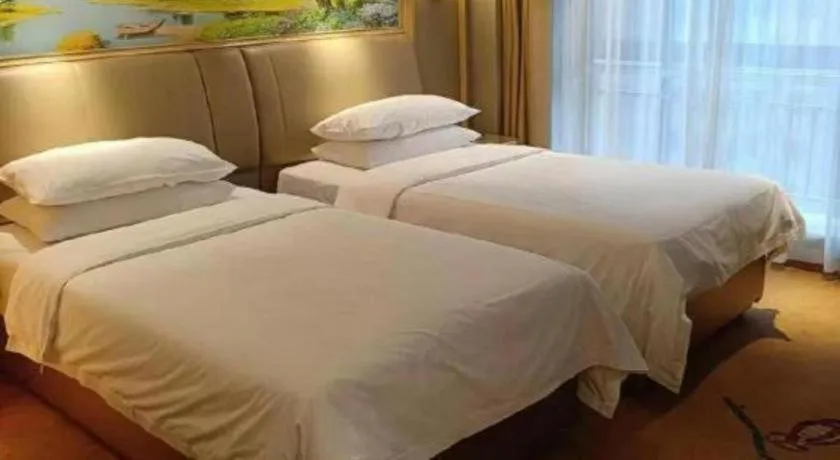 Bed in Vienna Hotel Shandong Liaocheng High-Tech Zong Yueji Park