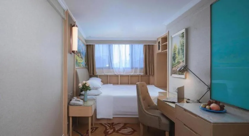 Bed in Vienna Hotel Shandong Liaocheng High-Tech Zong Yueji Park