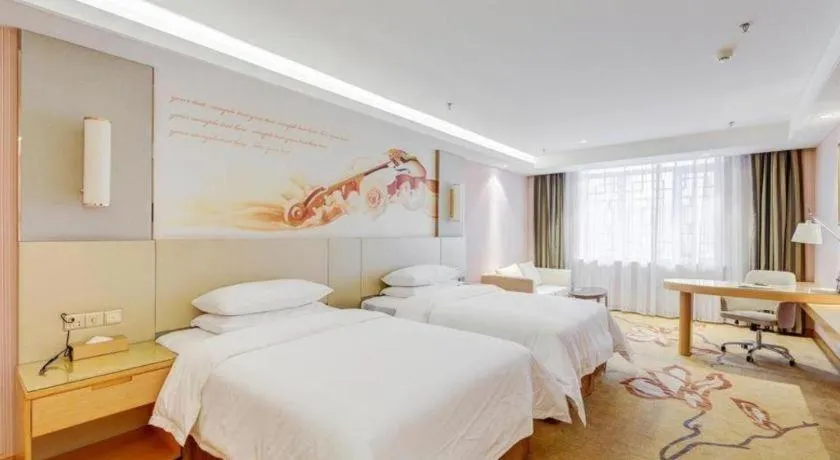 Bed in Vienna Hotel Shandong Qufu Sankong Landscape