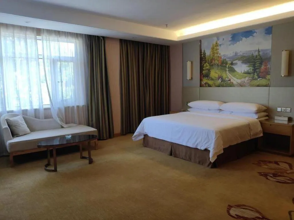 Bed in Vienna Hotel Shandong Qufu Sankong Landscape