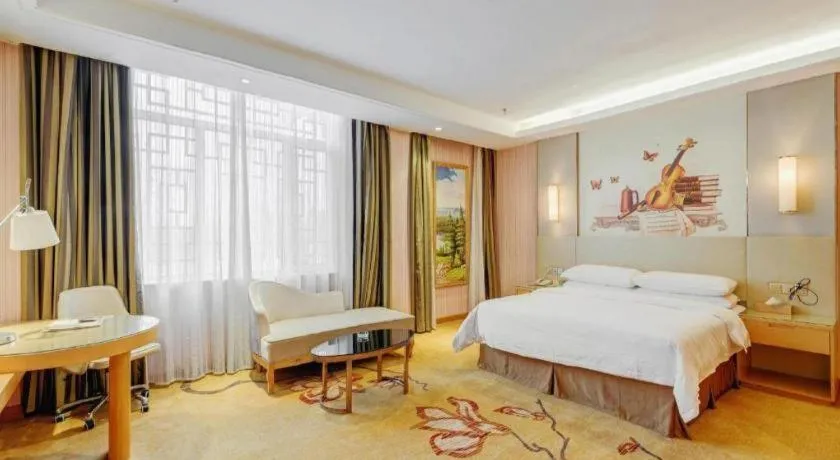 Bed in Vienna Hotel Shandong Qufu Sankong Landscape