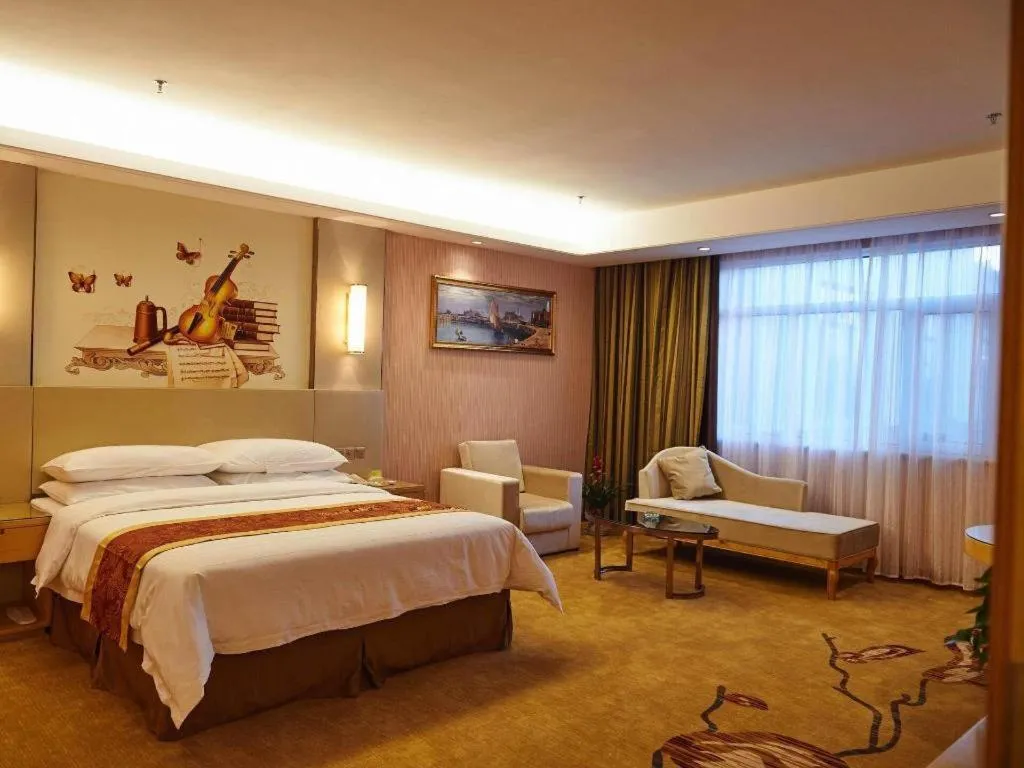 Bed in Vienna Hotel Shandong Qufu Sankong Landscape