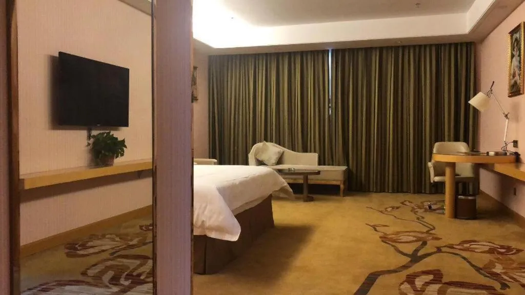 Bed in Vienna Hotel Shandong Qufu Sankong Landscape