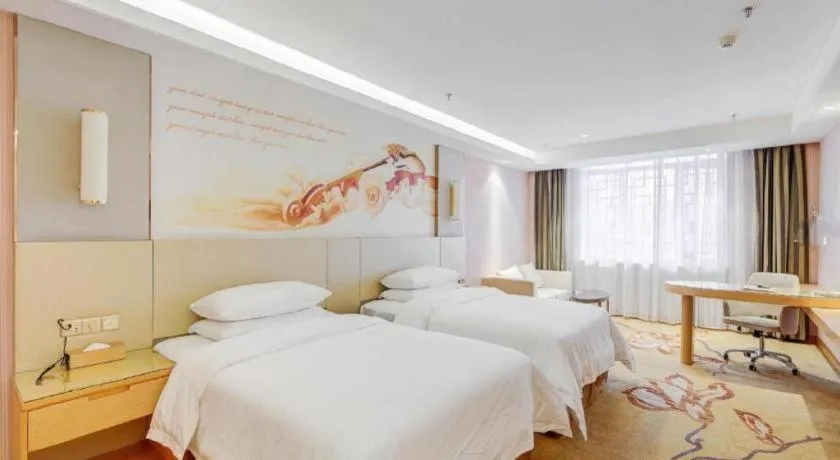 Bed in Vienna Hotel Shandong Qufu Sankong Landscape