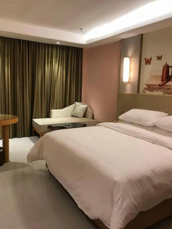 Bed in Vienna Hotel Shandong Qufu Sankong Landscape