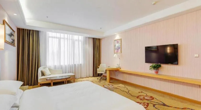 Bed in Vienna Hotel Shandong Qufu Sankong Landscape