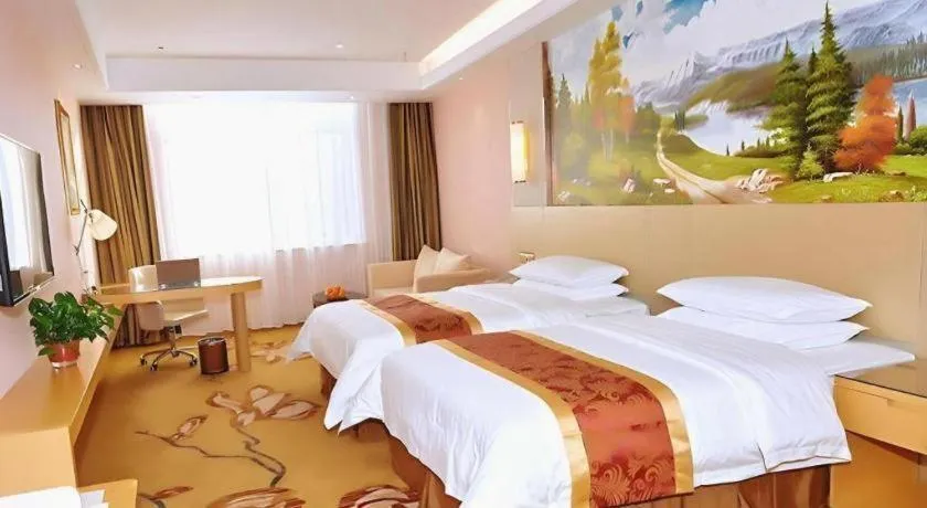 Bed in Vienna Hotel Shandong Qufu Sankong Landscape