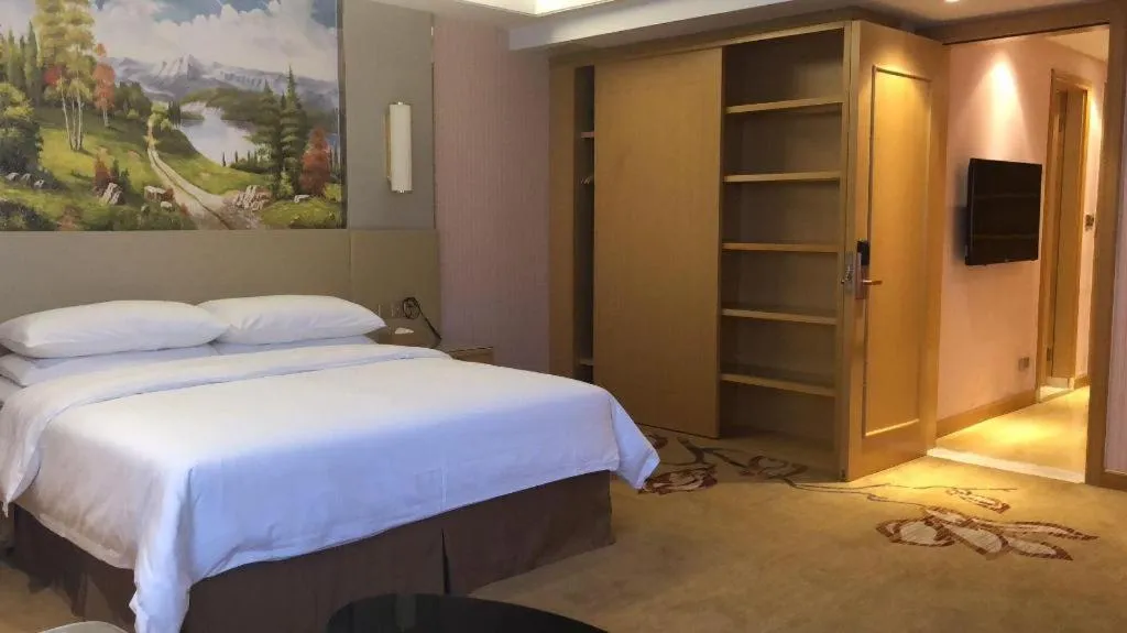 Bed in Vienna Hotel Shandong Qufu Sankong Landscape
