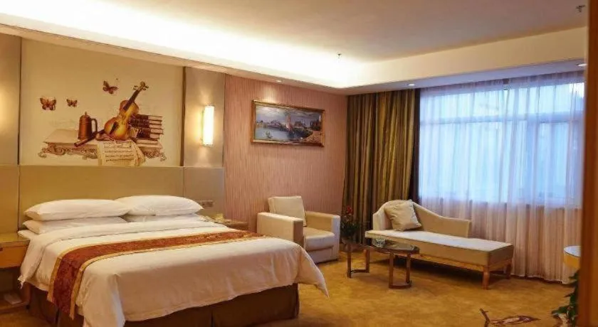 Bed in Vienna Hotel Shandong Qufu Sankong Landscape