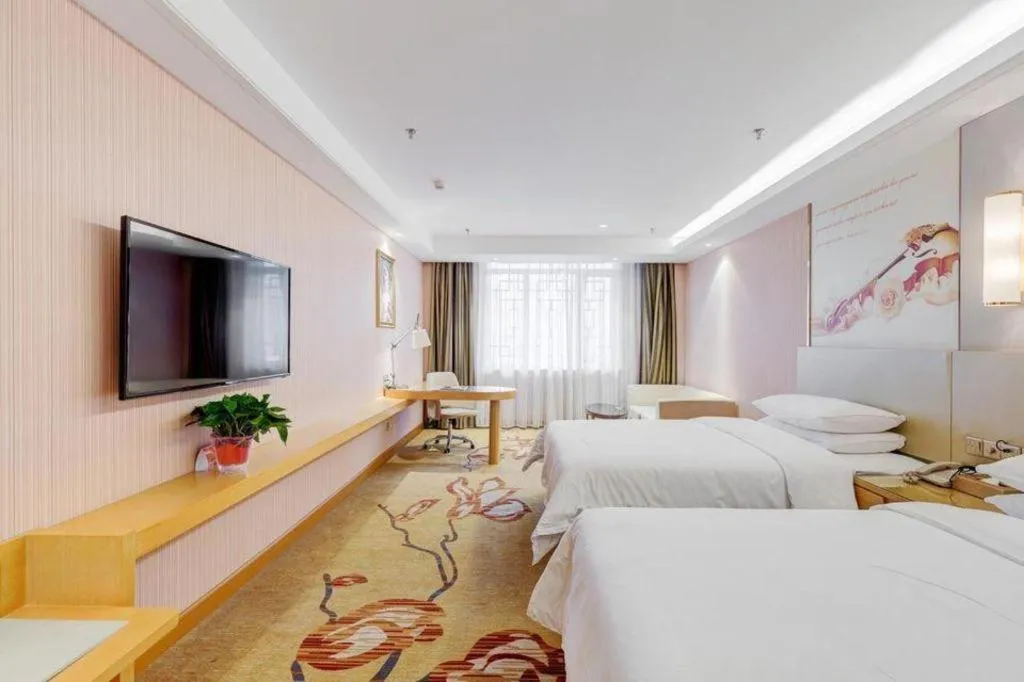 Bed in Vienna Hotel Shandong Qufu Sankong Landscape