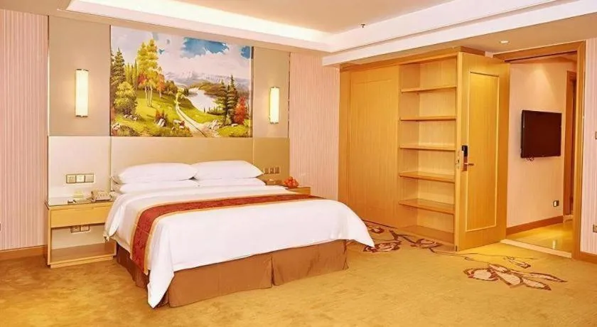 Bed in Vienna Hotel Shandong Qufu Sankong Landscape