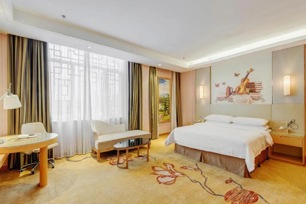 Bed in Vienna Hotel Shandong Qufu Sankong Landscape