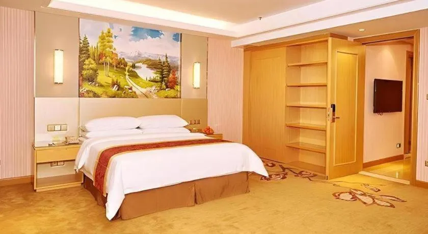 Bed in Vienna Hotel Shandong Qufu Sankong Landscape