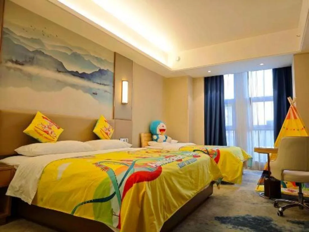 Bed in Vienna Hotel Shaanxi Hanzhong Central Square High-Speed Railway Station