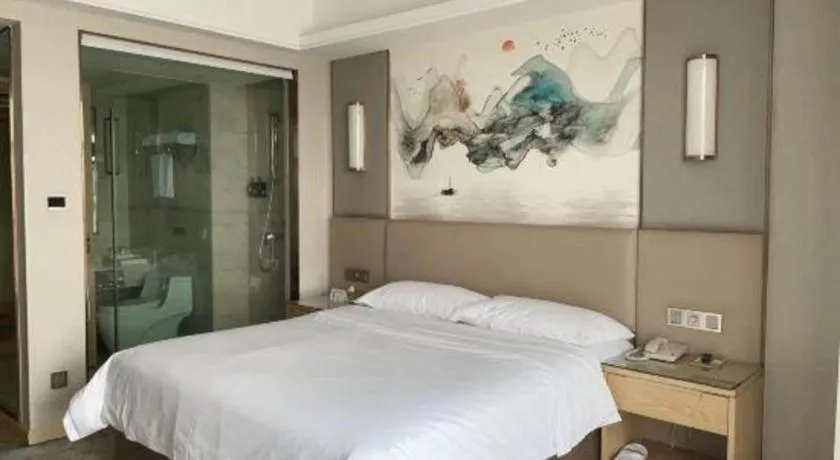 Bed in Vienna Hotel Shaanxi Hanzhong Central Square High-Speed Railway Station