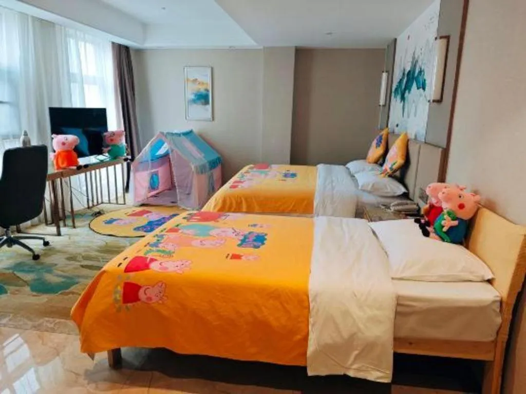 Bed in Vienna Hotel Shaanxi Hanzhong Central Square High-Speed Railway Station