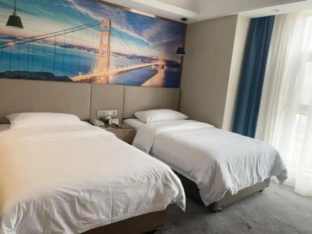 Bed in Vienna Hotel Shaanxi Hanzhong Central Square High-Speed Railway Station