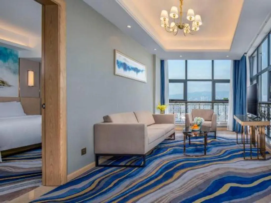 Bed in Vienna Hotel Shaanxi Hanzhong Central Square High-Speed Railway Station