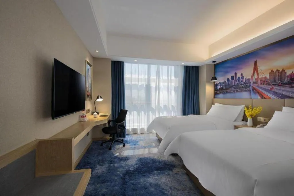 Bed in Vienna Hotel Shaanxi Hanzhong Central Square High-Speed Railway Station