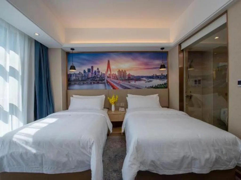 Bed in Vienna Hotel Shaanxi Hanzhong Central Square High-Speed Railway Station