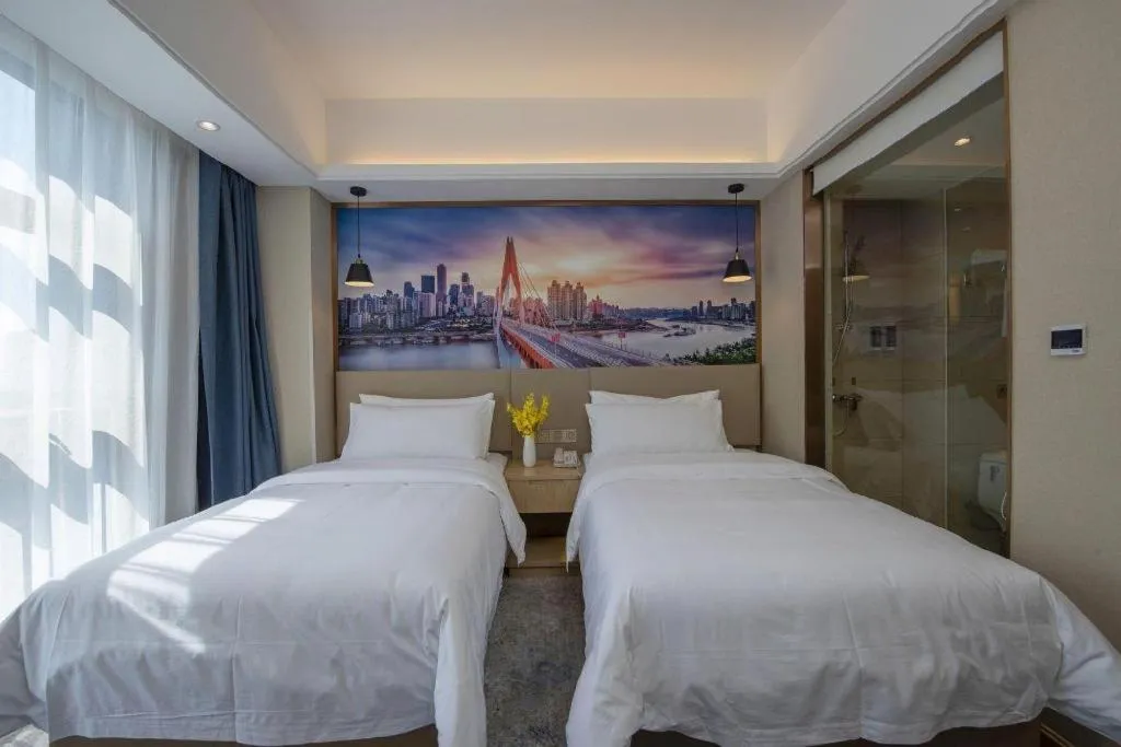 Bed in Vienna Hotel Shaanxi Hanzhong Central Square High-Speed Railway Station
