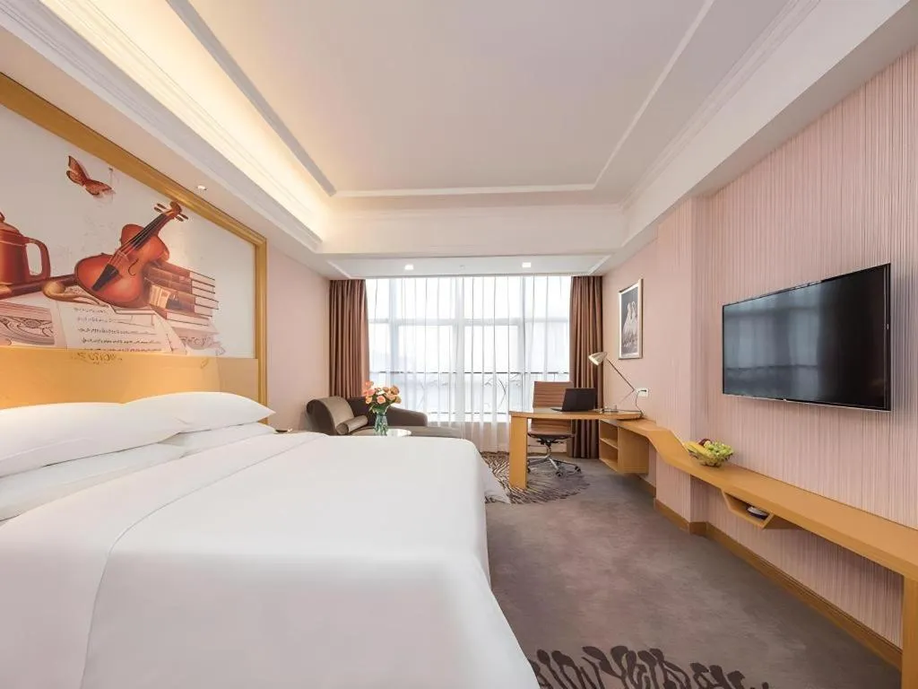 Bed in Vienna Hotel Guangzhou North Station Huaguoshan Metro Station