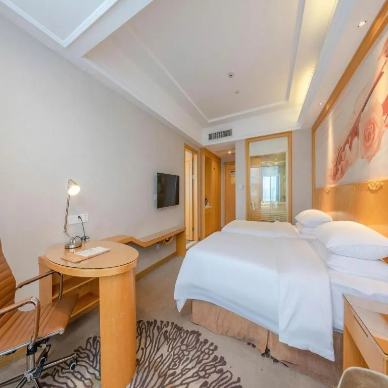 Bed in Vienna Hotel Guangzhou North Station Huaguoshan Metro Station