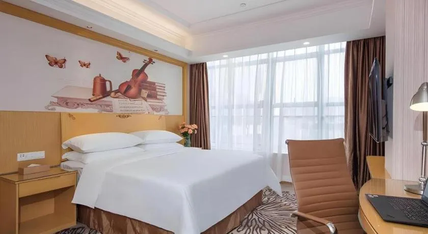 Bed in Vienna Hotel Guangzhou North Station Huaguoshan Metro Station