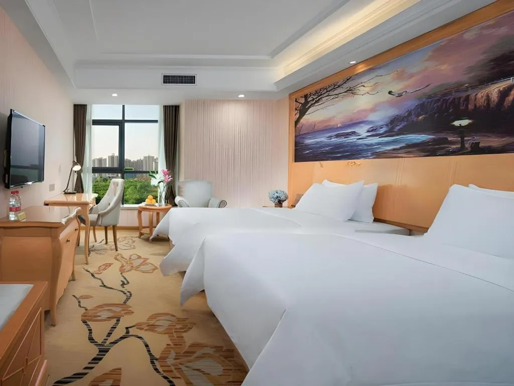 Bed in Vienna Hotel Shaanxi Ankang Jiangnan